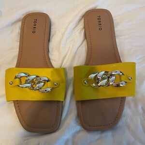 Size 11.5WW yellow flat sandals.